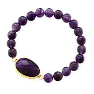 Bracelet femme perles améthyste violettes avec pierre ovale facettée sertie or.