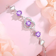 Bracelet argent pur avec charms cœur et pierres violettes facettées, modèle Stacy.