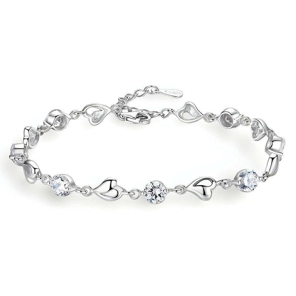 Bracelet en argent avec maille en forme de cœur et pierres claires rondes, modèle Brenda.