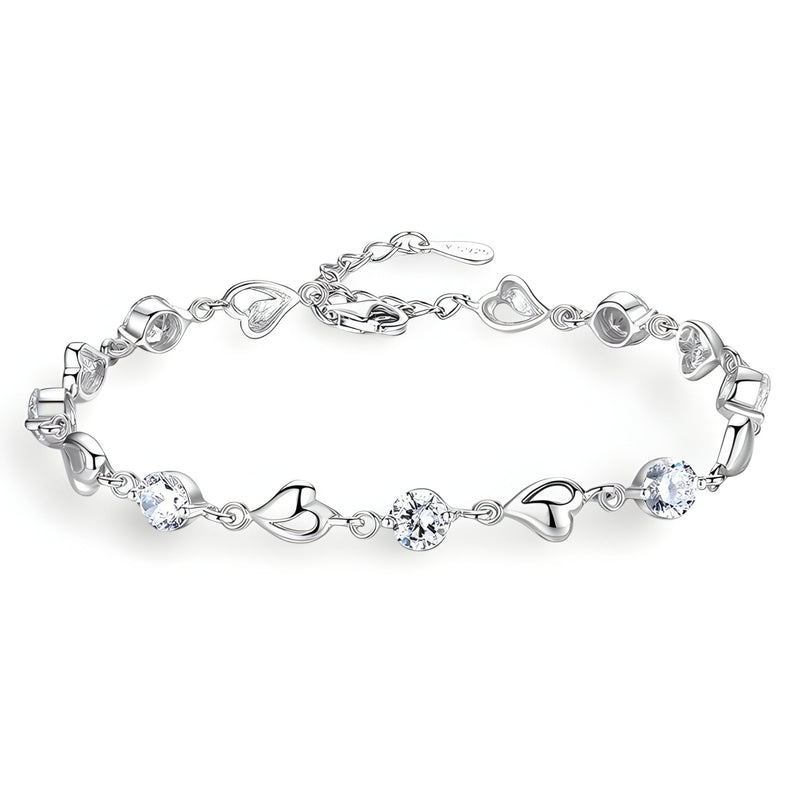 Bracelet en argent avec maille en forme de cœur et pierres claires rondes, modèle Brenda.