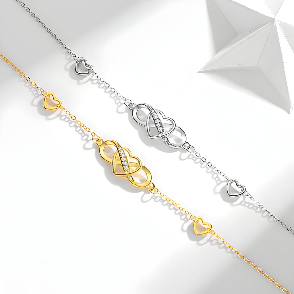 Bracelet en argent sterling fin avec pendentif infini et cœur ajouré en argent et or jaune délicat.