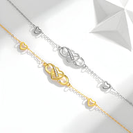 Bracelet en argent sterling fin avec pendentif infini et cœur ajouré en argent et or jaune délicat.