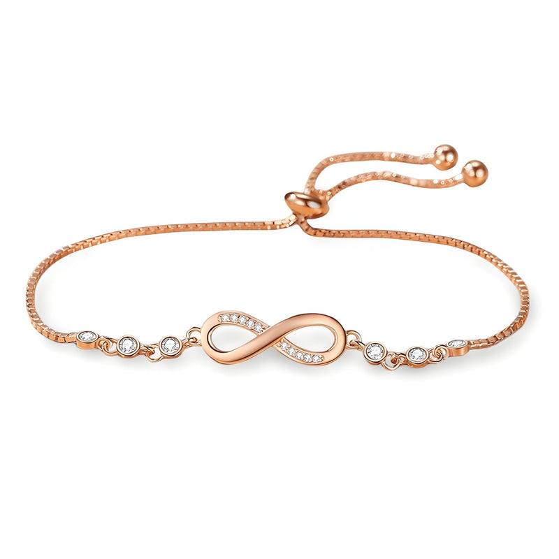 Bracelet réglable en argent rosé avec charm infini pavé de petits cristaux et chaîne fines élégante.