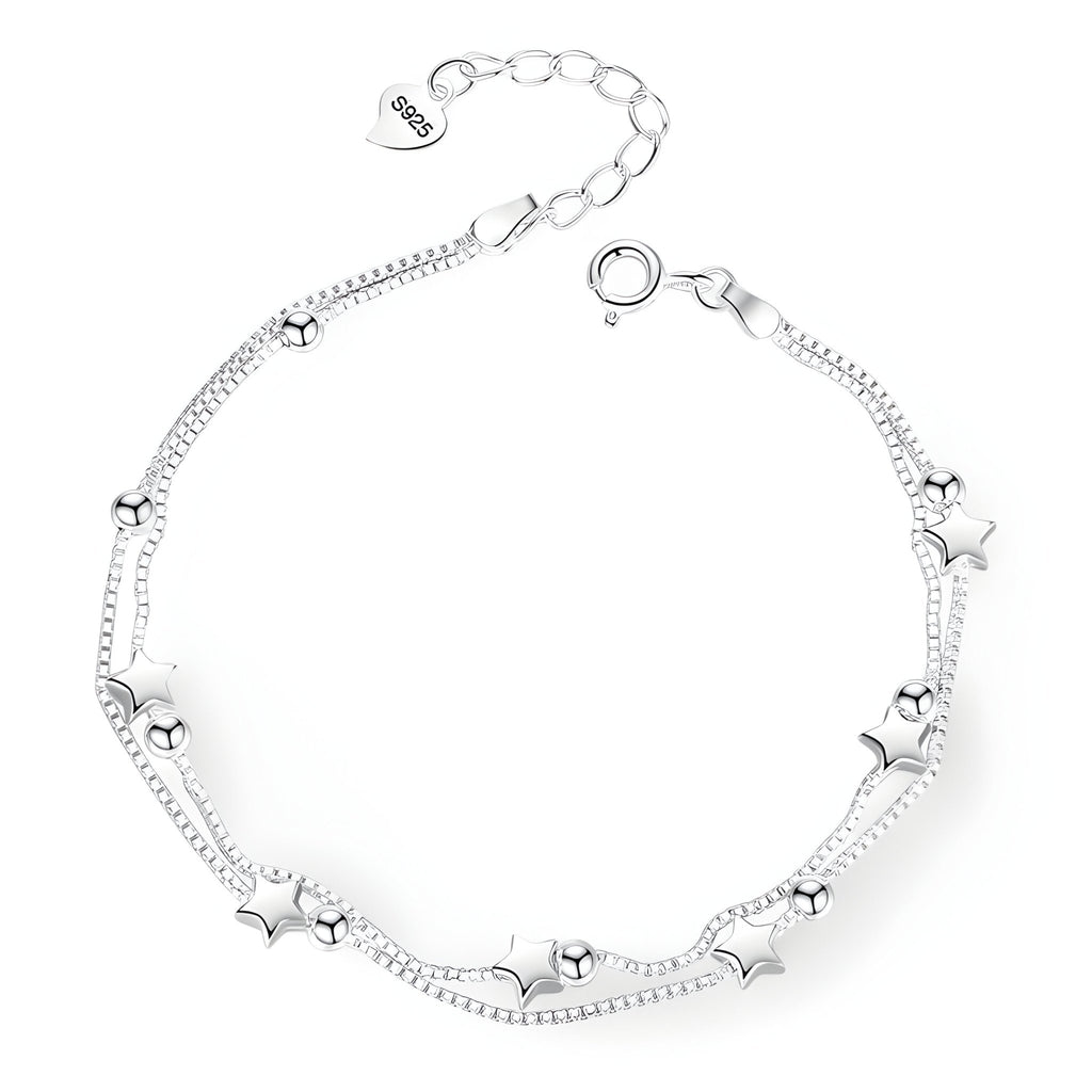 Bracelet en argent sterling fin avec petits motifs étoiles et cœurs, chaîne ajustable.