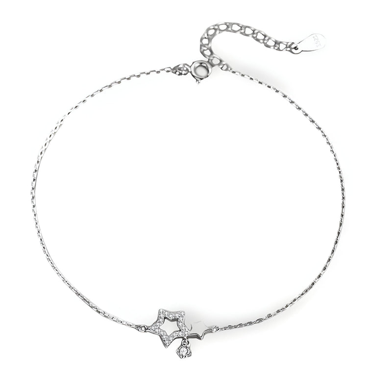 Bracelet fin en argent sterling avec pendentif double étoiles et petit cristal suspendu.