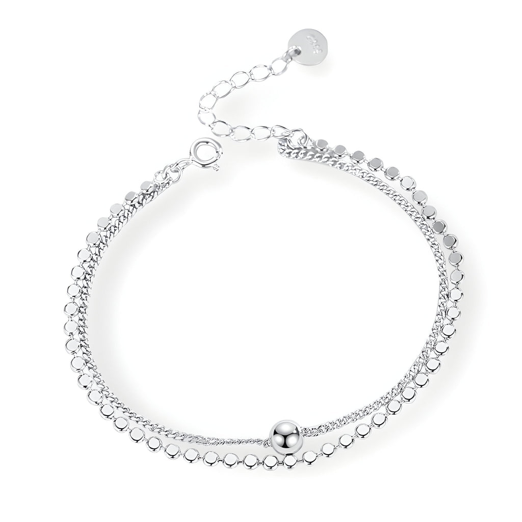 Bracelet double maille en argent sterling avec petite perle et chaîne ajustable.