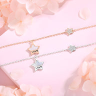 Bracelet en argent sterling avec étoile ajourée et gravure "Love", chaîne fine.