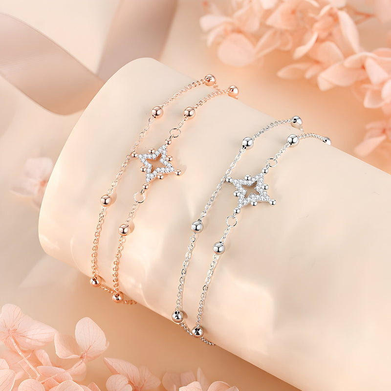 Bracelet Maud en argent sterling avec étoile centrale et petites billes, disponible en argent rosé et argent classique.
