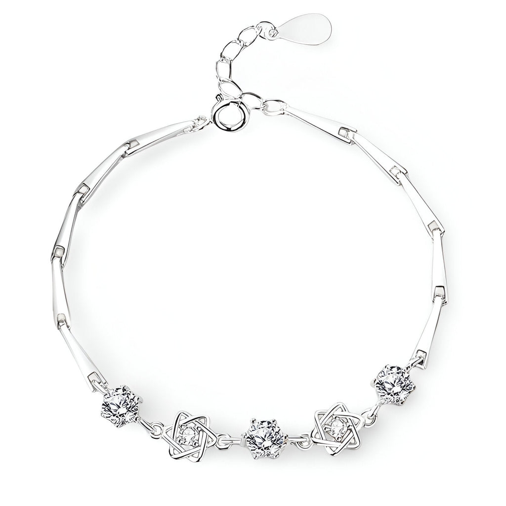 Bracelet en argent sterling avec étoiles ajourées et pierres scintillantes, modèle Lucia.