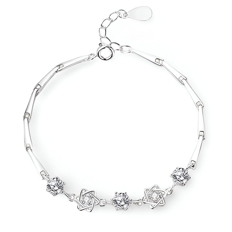 Bracelet en argent sterling avec étoiles ajourées et pierres scintillantes, modèle Lucia.