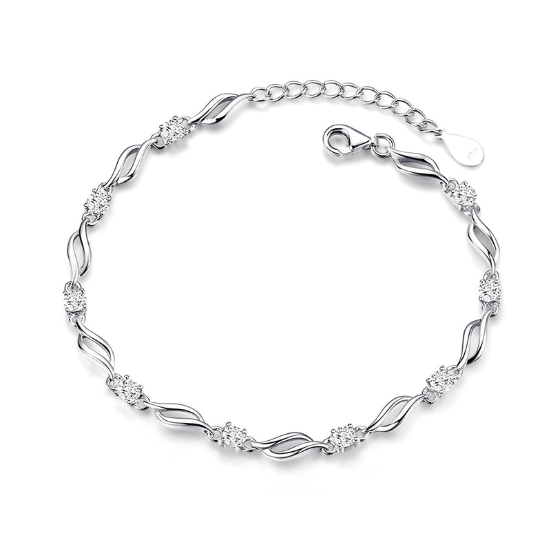 Bracelet femme en argent sterling avec maillons ondulés et détails floraux délicats.