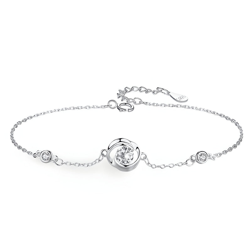 Bracelet en argent sterling avec zirconium central rond et deux petits zirconiums sur chaîne fine.