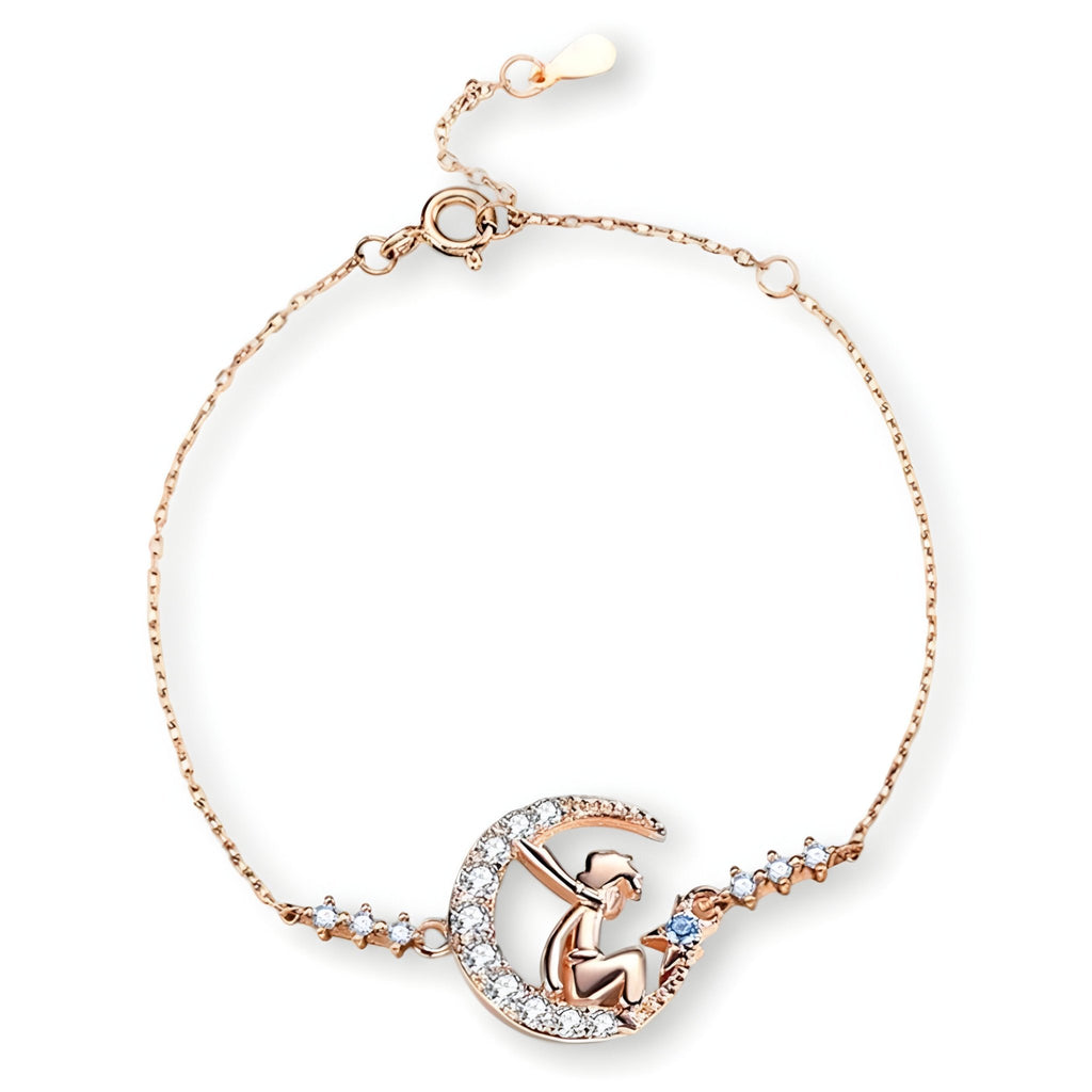 Bracelet fin en or rosé avec pendentif Petit Prince et cristaux étincelants.