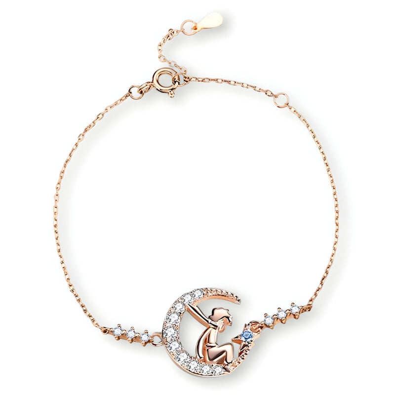 Bracelet fin en or rosé avec pendentif Petit Prince et cristaux étincelants.