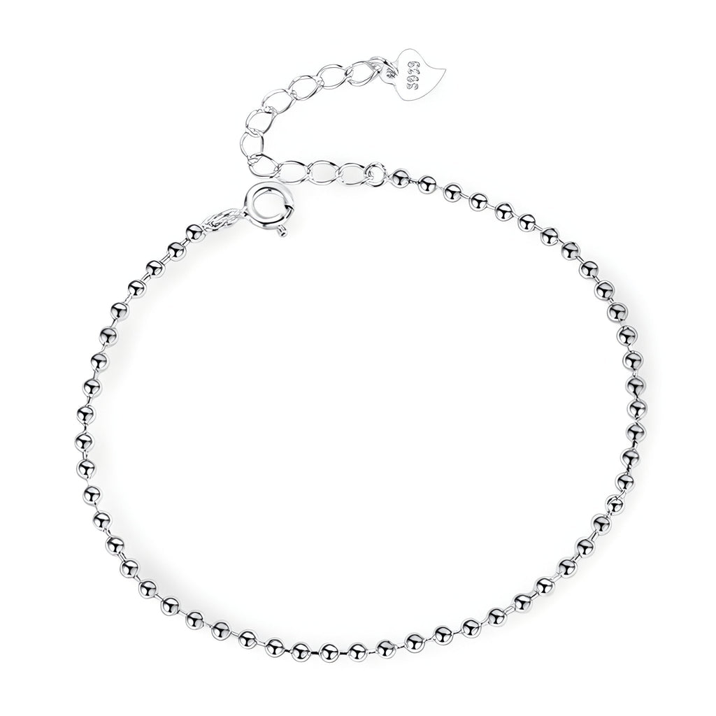 Bracelet fin en argent sterling avec petites perles rondes et fermoir ajustable.
