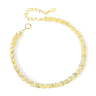 Bracelet torsadé en argent sterling doré avec chaîne réglable et fermoir anneau spring.