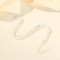 Bracelet torsadé en argent sterling avec fermoir à ressort et chaîne de réglage.