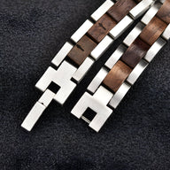 Bracelet homme en bois de noyer foncé et acier inoxydable brillant, maillons rectangulaires alternés.