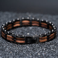 Bracelet homme en bois de noyer noir et marron avec maillons métalliques noirs, style robuste et élégant.
