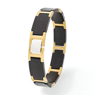 Bracelet homme en bois d’ébène noir avec liens en métal doré et plaque centrale argentée.