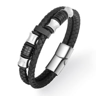 Bracelet homme en cuir noir tressé avec détails acier inoxydable brossé et fermoir magnétique.