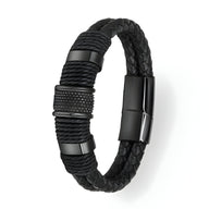 Bracelet en cuir noir tressé avec cordelettes enroulées et fermoir métal noir mat.