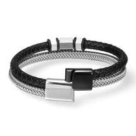 Bracelet homme en cuir noir tressé et cordon acier inoxydable avec fermoir métallique argenté et noir.
