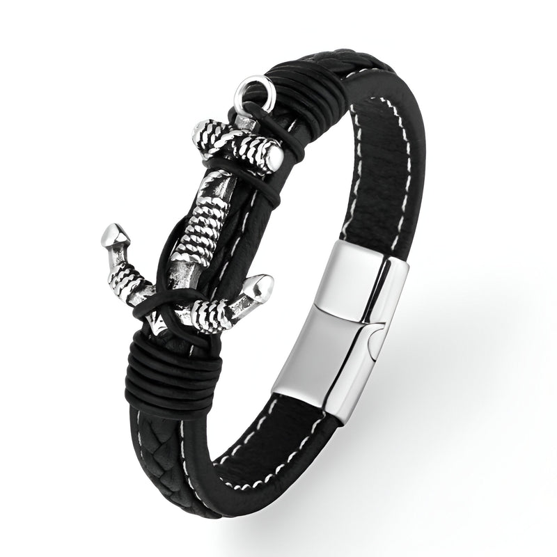 Bracelet noir en cuir tressé avec motif ancre argentée entrelacée et fermoir métallique brillant.