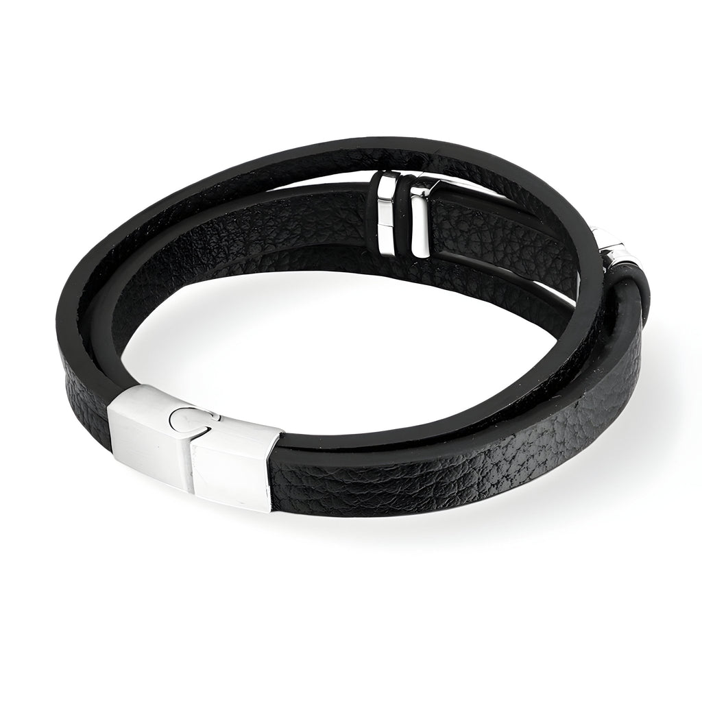 Bracelet en cuir noir à double tour avec motif boussole et fermoir métallique argenté.