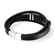 Bracelet en cuir noir à double tour avec motif boussole et fermoir métallique argenté.