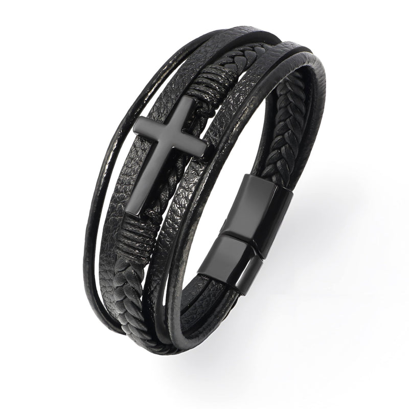 Bracelet en cuir noir multi-brins avec croix mate et fermoir magnétique noir.