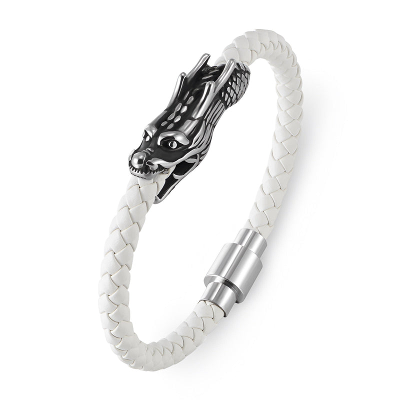 Bracelet en cuir blanc tressé avec tête de dragon noire et fermoir métallique argenté.