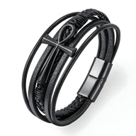 Bracelet multi-rangs en cuir noir avec motif croix en métal argenté et fermoir magnétique noir mat.