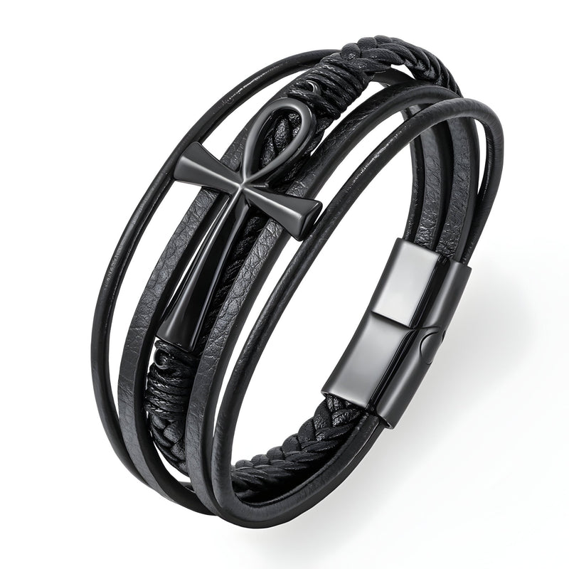 Bracelet multi-rangs en cuir noir avec motif croix en métal argenté et fermoir magnétique noir mat.