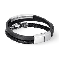 Bracelet multi-rangs en cuir noir tressé avec fermoir magnétique en acier inoxydable brillant.
