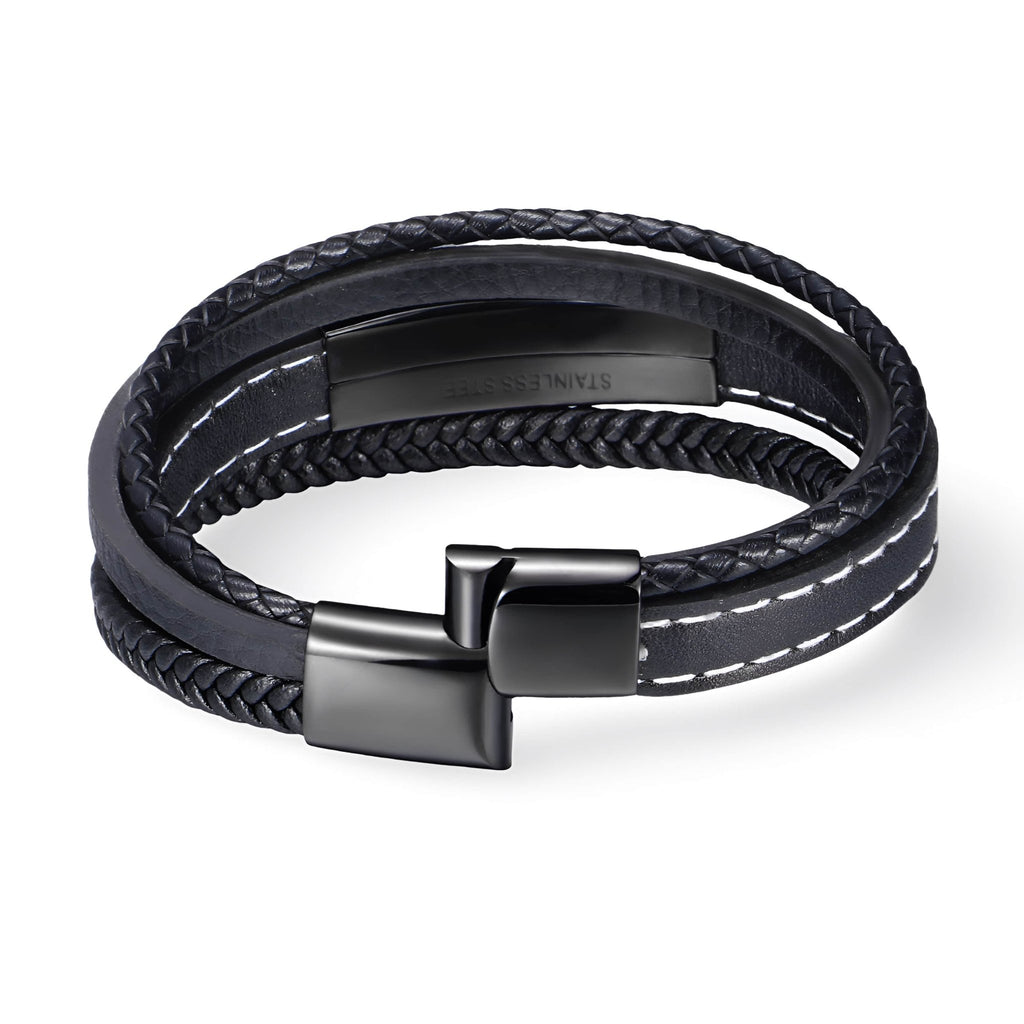 Bracelet en cuir noir multi-rangs avec surpiqûres blanches et fermoir métallique noir mat.