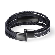 Bracelet en cuir noir multi-rangs avec surpiqûres blanches et fermoir métallique noir mat.