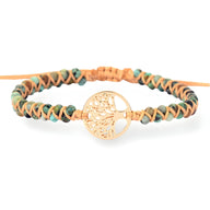 Bracelet en pierres de jaspe beige et marron tressées avec arbre de vie doré au centre.