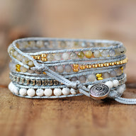 Bracelet multi-rangs en pierres naturelles quartz rose, labradorite et perles grises, fermoir rond argenté gravé.