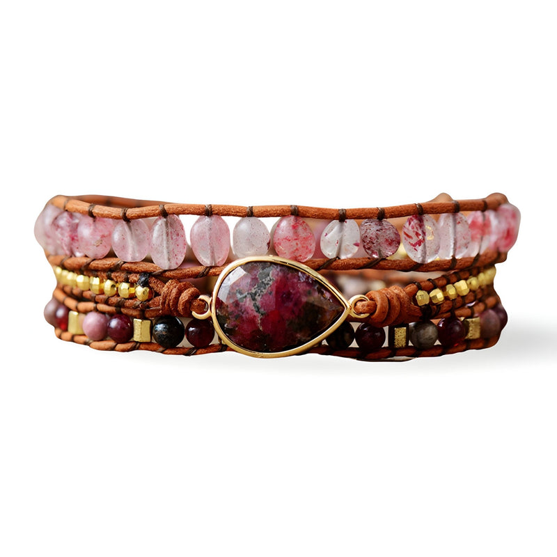 Bracelet multi-rangs marron en rhodonite, quartz rose et perles dorées avec pierre centrale ovale.