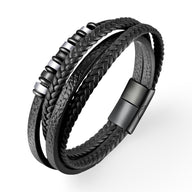 Bracelet multi-rangs noir avec perles en acier inoxydable et fermoir magnétique mat.