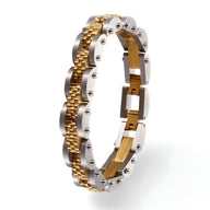 Bracelet pour homme en titane et acier inoxydable bicolore argent et or avec maillons texturés et finition polie brillante.