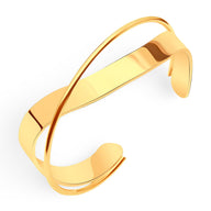 Bracelet jonc en titane plaqué or 18 carats au design original Elmira, forme croisée élégante.