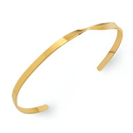 Bracelet fin en titane plaqué or 18 carats avec design torsadé et ouvert aux extrémités.