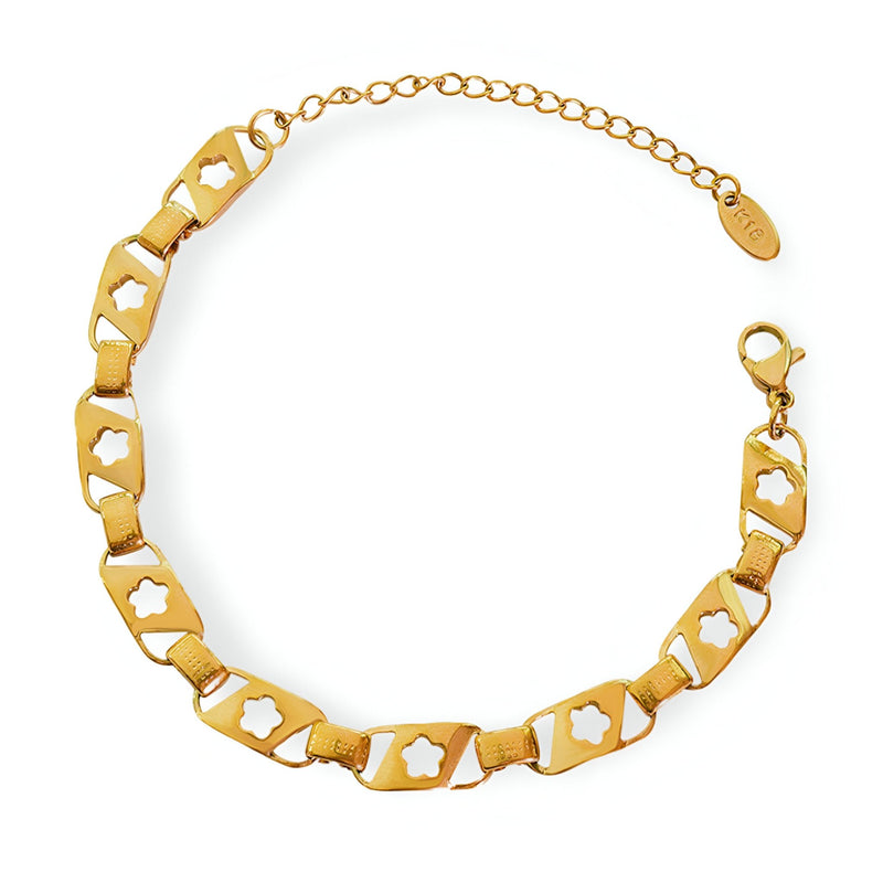 Bracelet en titane plaqué or 18 carats avec maillons hexagonaux et étoiles creuses, fermoir mousqueton.