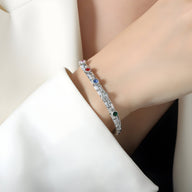 Bracelet argenté en titane avec zircons colorés multicolores, design délicat Daisy.