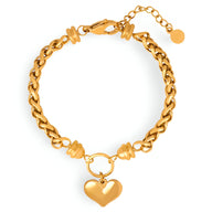 Bracelet en titane plaqué or avec maille torsadée et pendentif cœur lisse brillant.