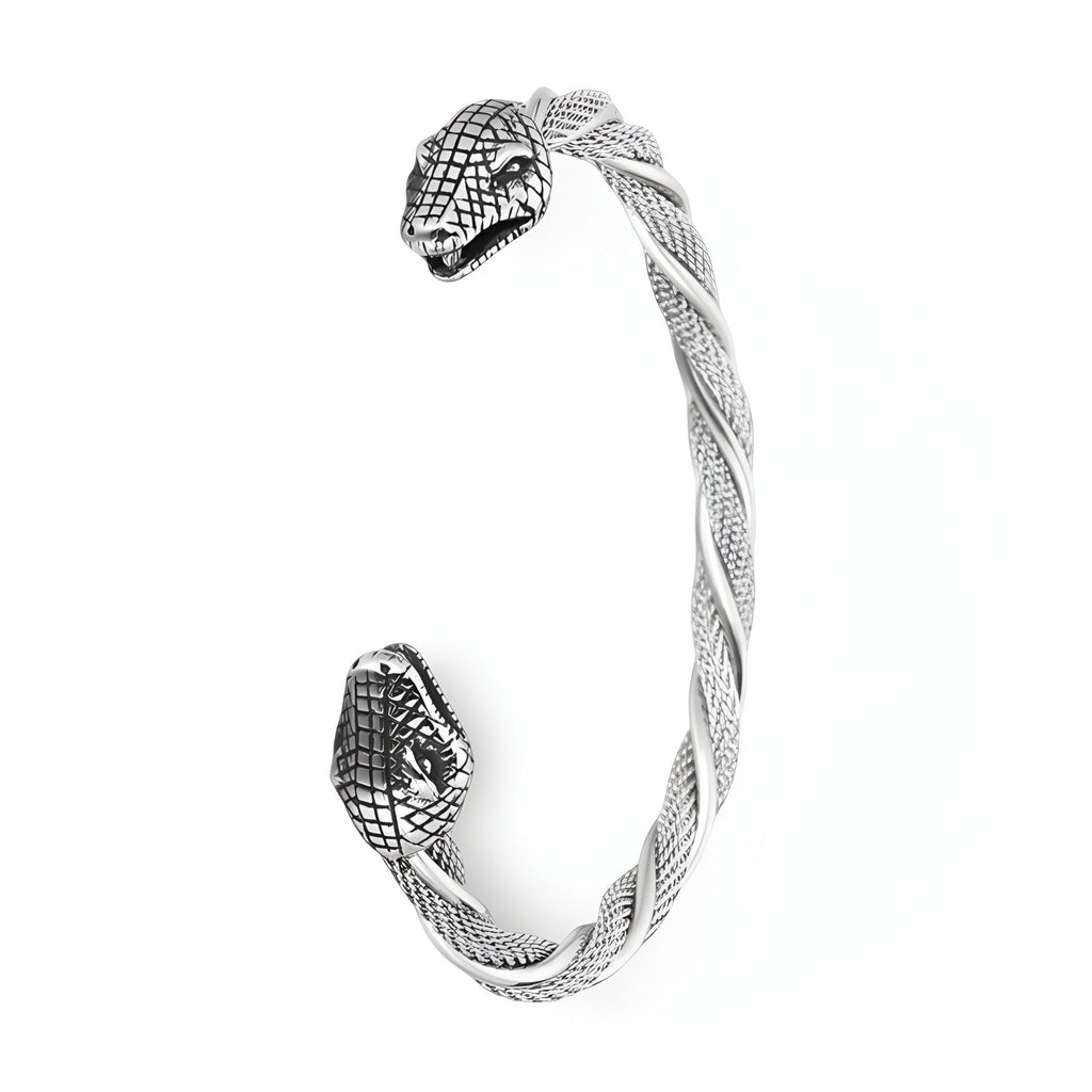 Bracelet jonc argent en acier inoxydable torsadé à double têtes de serpent texturées.