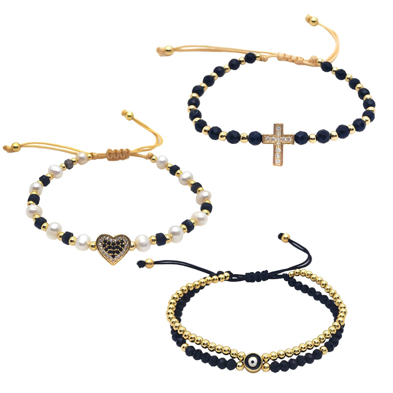 Trio de bracelets noirs avec perles, strass, cœur et croix dorée, style ajustable.